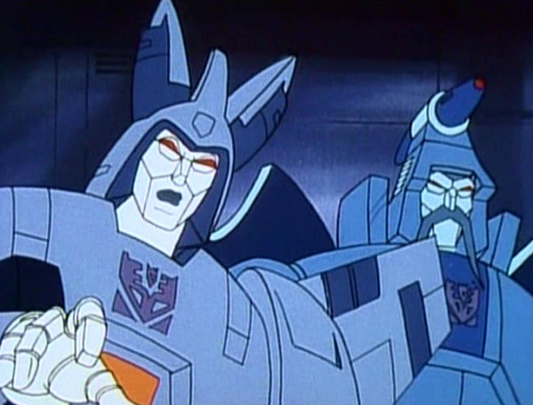 "Ugh, lord Galvatron! What is...?" "Fool! Feel the stench of Galvatron's breakfast burrito!" The Shadow Emperor, Scorponok
