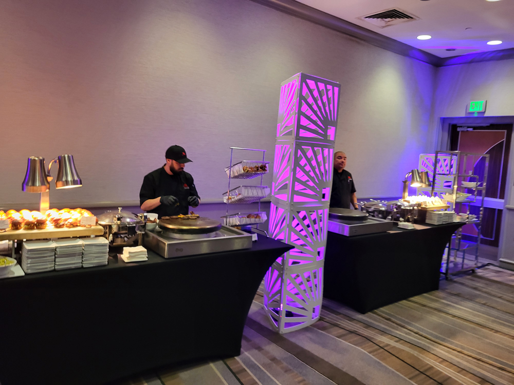 The food table. Pulled pork BBQ and hamburger sliders, fish and chicken tacos, toppings. Mmmmm.