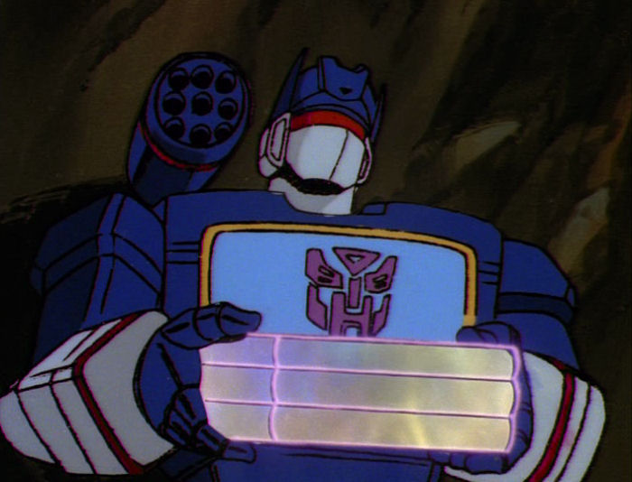Giving him lots of energon pizza makes him change his faction. More than Meets the Eye, Part 3