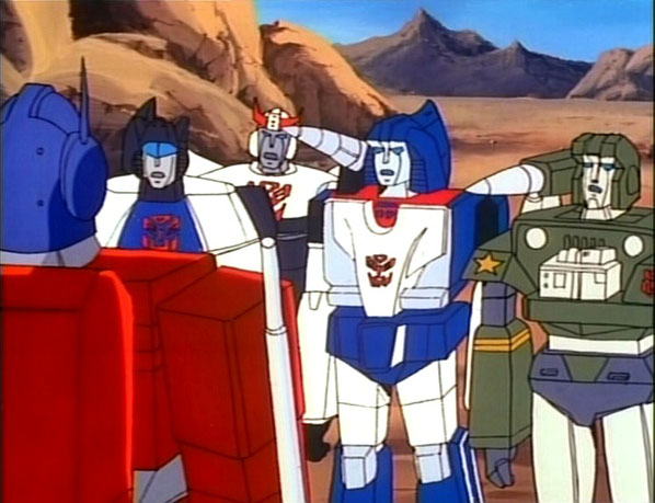 Reaction to Prowl's door fusing with Mirage's head? Dull surprise! More than Meets the Eye, Part 3