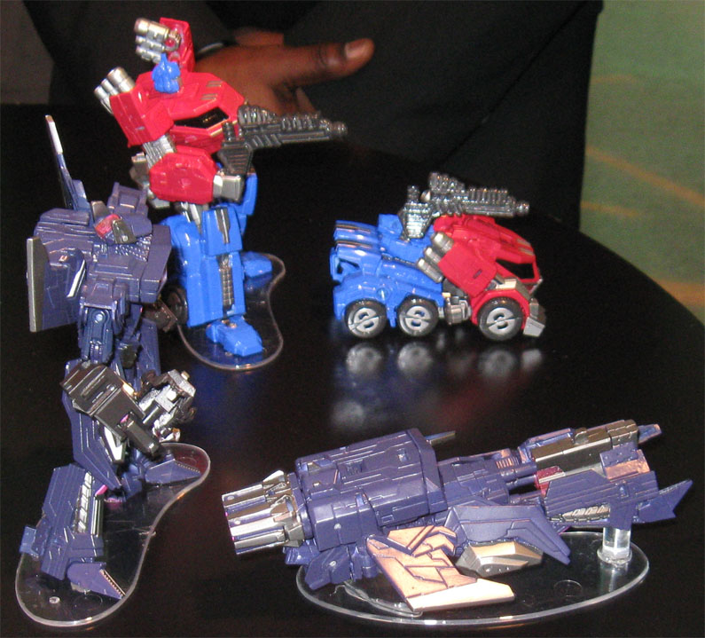 Optimus and Shockwave in profile